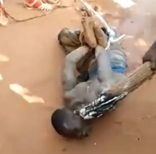 Dude Tortured with Burning log.