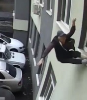Dude Jumps to his Death after Throwing Shit out the Window