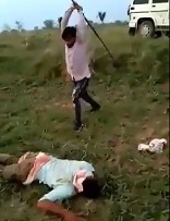 Dude Brutalized by Thugs with Sticks