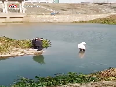 CCTV:  Girl Commits Suicide By Drowning In Front Of Authorities (longer version).