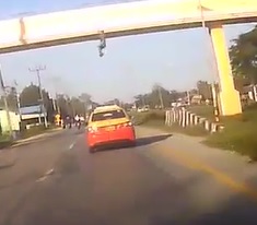 Dude Jumps into Oncoming Traffic.