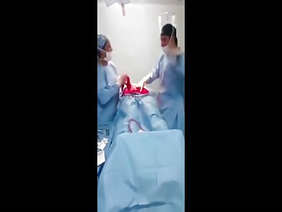 SURGEON AND NURSE GET FUNKY DURING SURGERY 