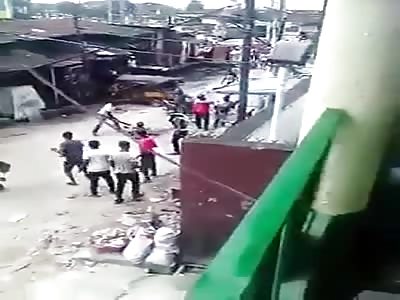 STREET VS. STREET GANG FIGHT IN LAGOS, ONE GUY GETS HACKED AND STONED 