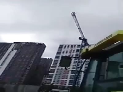 Police Officer Leaps from Crane