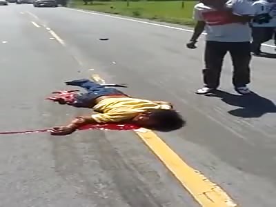 Motorcyclist crushed by a van