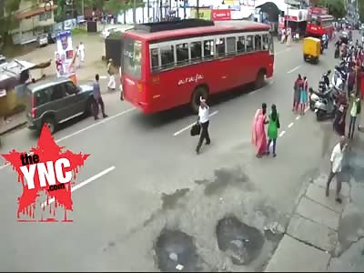 Woman run over by a bus