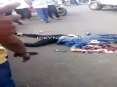 Woman dies with her head crushed by a Bus