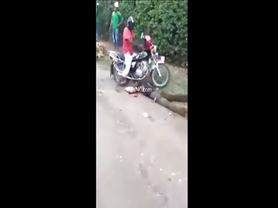 Thief Hit With Stones In The Head And Run Over By Motorbike