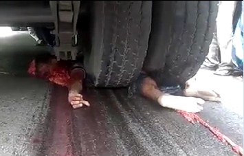 Motorcyclist Man Was Crushed And Dragged By A Truck