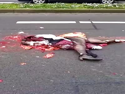 Woman Flattened to death on the road..
