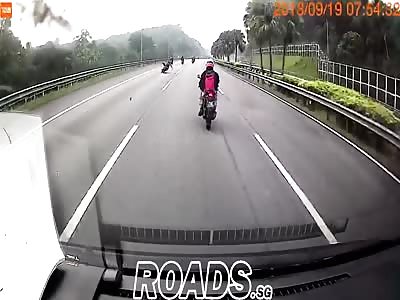 Motorcyclist In Russia Hits Rock, Wipes Out, Then Gets Run Over (Dashcam)