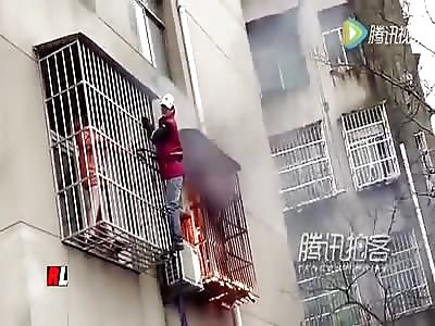 WORKER GIRL IS SAVED FROM FIRE BY FORMER POLICE OFFICER