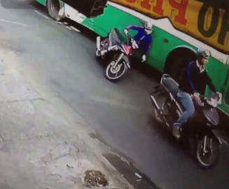 RIDER HEAD RUN OVER BY BUS