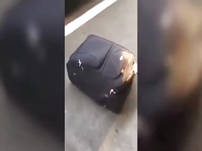ERITREAN MIGRANT EMERGES FROM INSIDE A SUITCASE