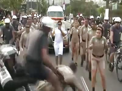 MOTORCYCLE ACCIDENT DURING THE OLYMPICS TORCH RELAY (AND IDIOT TAKING A SELFIE)