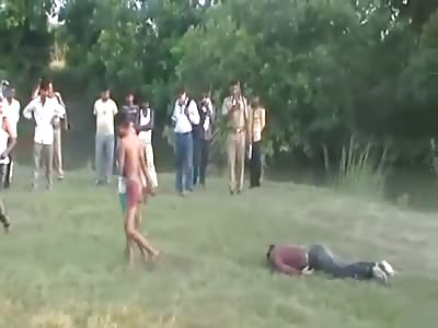 DEAD BODY TIED AND DRAGGED FROM RIVER