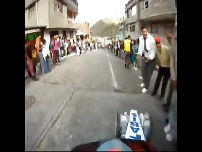 WOMAN BEING RUN OVER BY STREET LUGE