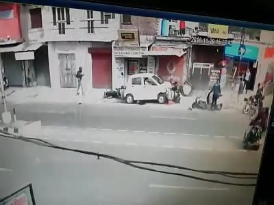 SPEEDY CAR RUNS OVER PEOPLE ON THE ROAD
