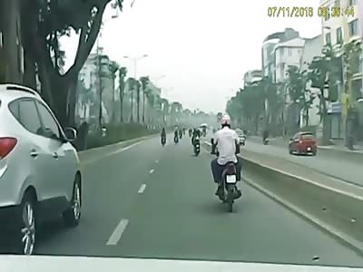 GIRL IN A SCOOTER IS HIT BY CAR AND THEN RUN OVER BY A MOTORCYCLE