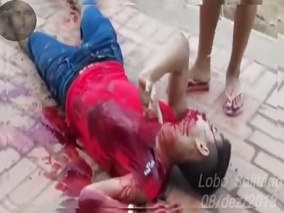 MAN DYING COVERED IN BLOOD