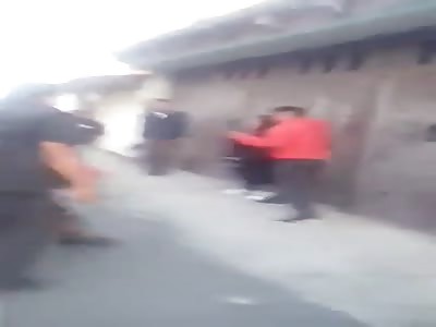 COUPLE BEING BEATEN BY MOB