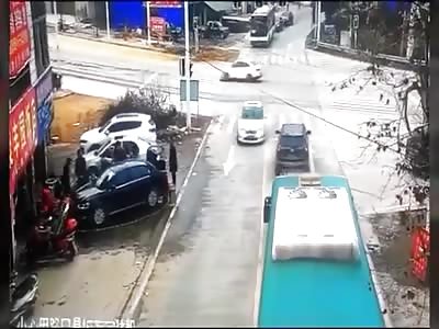 MAN BEING CRUSHED BY CAR