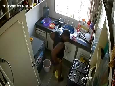 HOUSE-HELP DEFECATES AND URINATES IN A KITCHEN