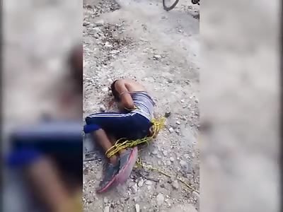 THIEF TIED AND BEATEN