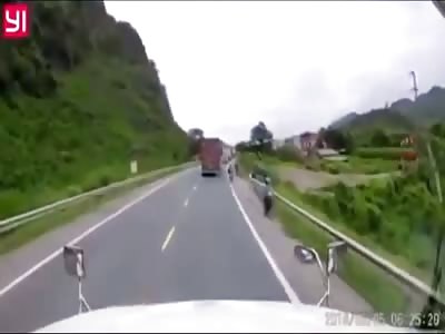 CYCLIST BEING HIT BY TRUCK