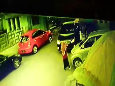 WOMAN BEING CRUSHED BY CAR