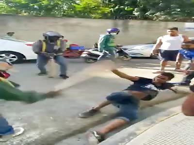 THIEF BEING DRAGGED AND BEATEN BY ANGRY MOB