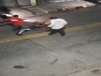 MAN BEING BEATEN BY MOB