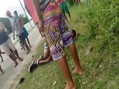 THIEF IS TIED AND BEATEN BY MOB 