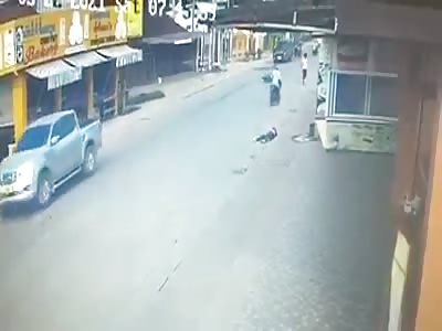 YOUNG GIRL BEING HIT BY MOTORCYCLE 