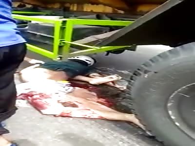 RIDER CRUSHED BY TRUCK