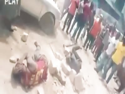 WATCH THIS GUYS BEING BEATEN AND STONED TO DEATH.