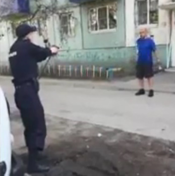 RUSSIAN MAN WITH KNIFE BEING SHOT DEAD BY POLICE