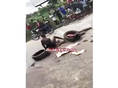 AFRICAN PUNISHMENT: TIRE AND FIRE