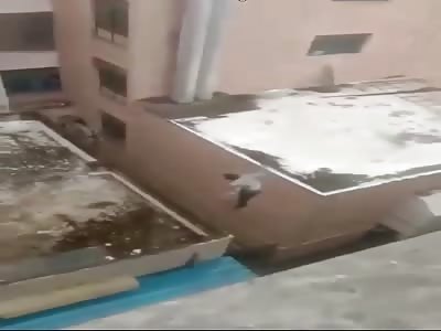 COMPLETELY CRAZY: MAN JUMP FROM BUILDING