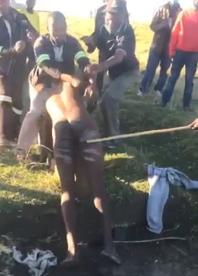 AFRICAN PUNISHMENT FOR A NAKED MAN