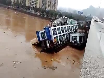 Two ships capsize on south China river due to Flooding. 