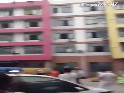 Two students jump off building.