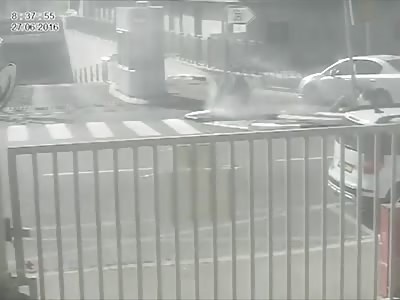 Wheel Flies off Passing Garbage Truck and Knocks Down Security Guard.