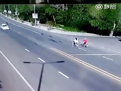 Car runs over a woman Cycling.