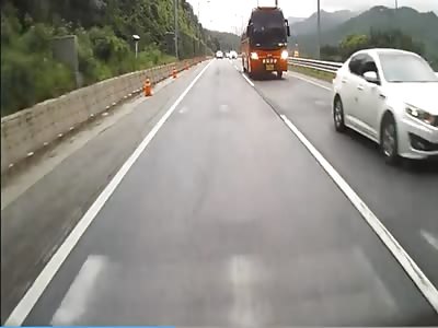 Tour bus smashes cars killing 4 and injuring 16. (Video with audio)