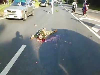 Motorcyclist Head Crushed By Truck.