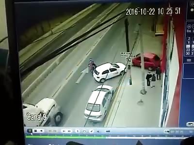 Biker Hits Car Then get Run Over By Truck.