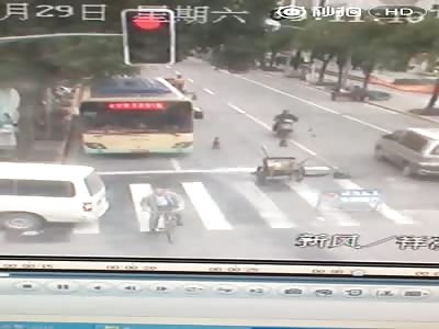  Rider waiting at red light run over by reversing Vehicle.
