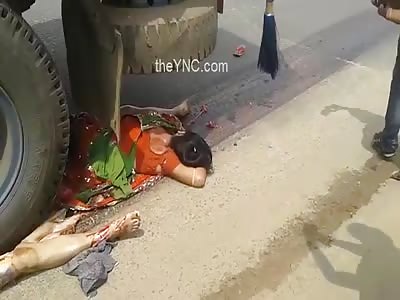WOMAN CRUSHED BY TRUCK
