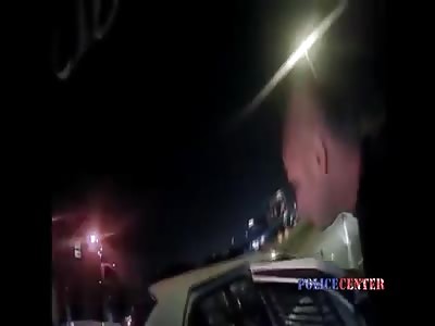 Bodycam Shows Officer Jump To Avoid Intoxicated Driver